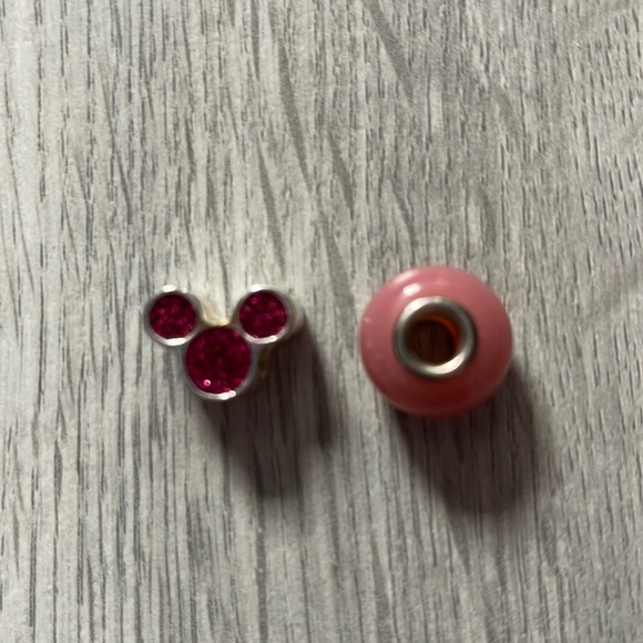 Disney Jewelry - Disney world bracelet charms set of 2